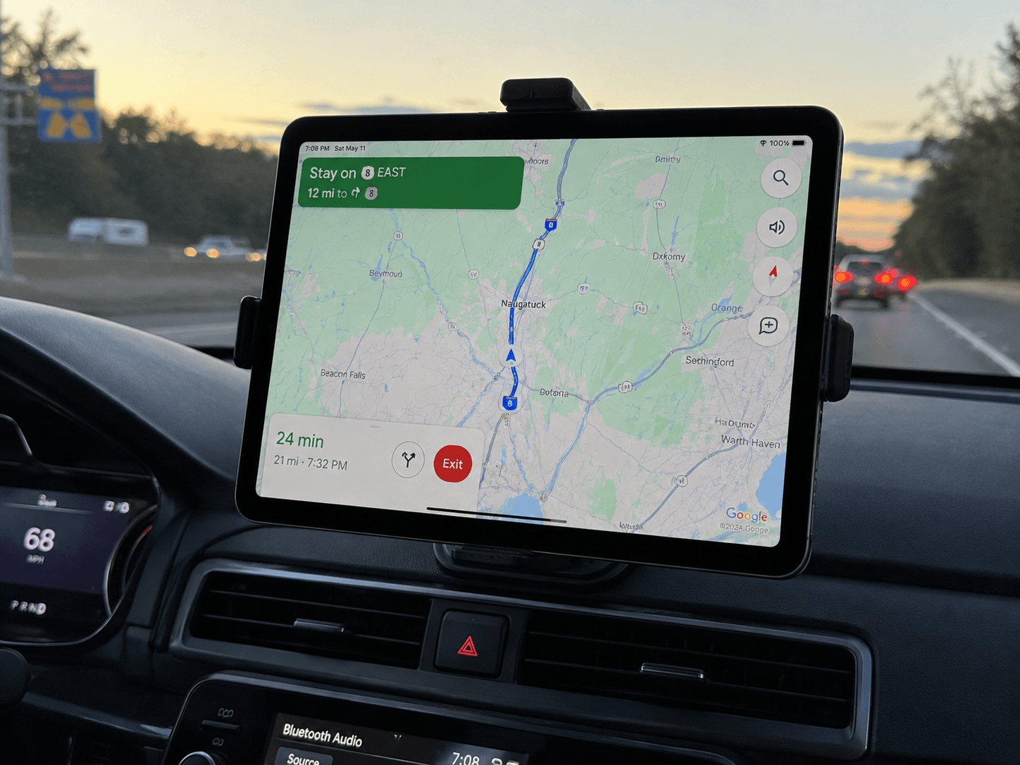 iPad mounted on dashboard showing Google Maps